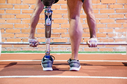 Man with Amputee Lifting Weight