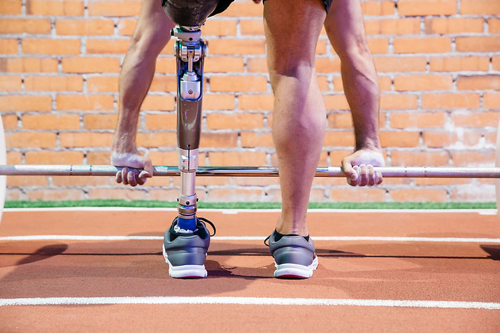 Man with Amputee Lifting Weight
