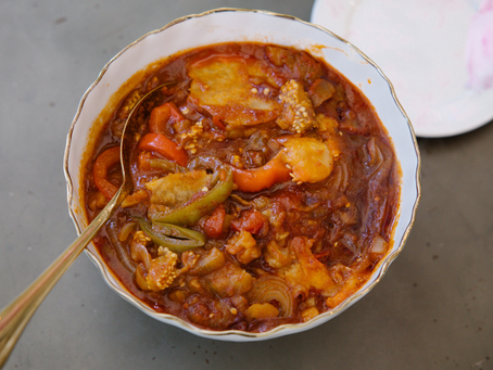 A simple Persian Yatimcheh summer stew made with eggplant, tomatoes, potatoes, bell peppers, onions, and a rich tomato sauce.