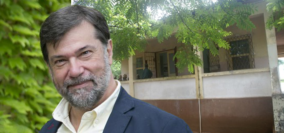 CISM Founding Scientific Director Pedro Alonso, with the room where it all began in the background.