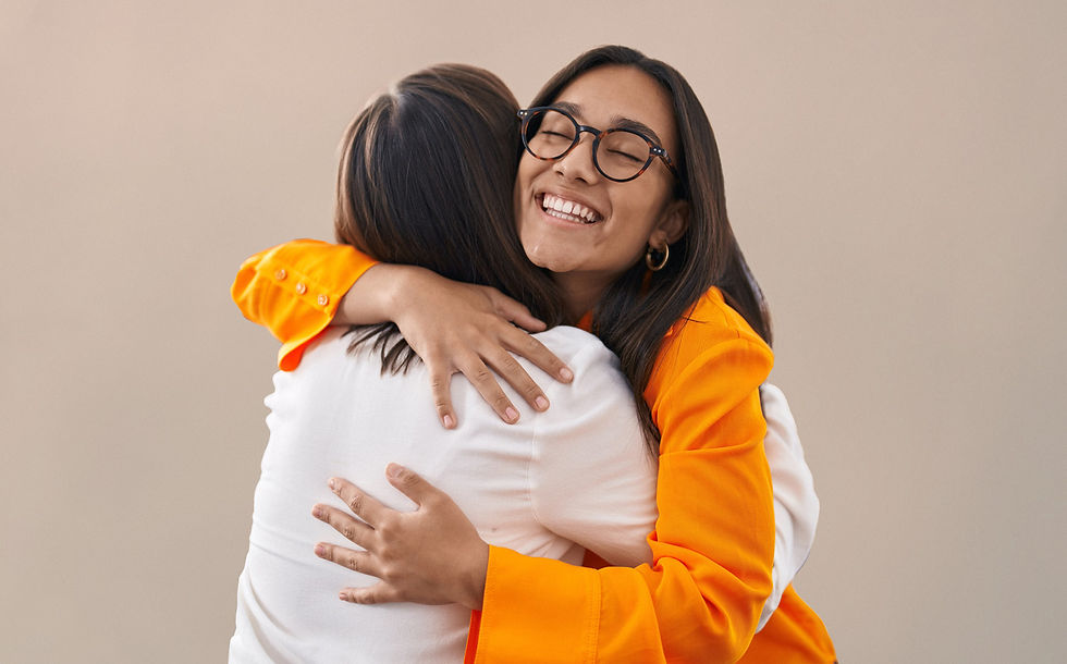Women hugging each other