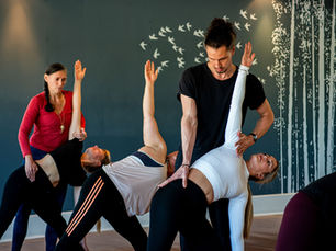 Yoga teacher training students in Cape Town practicing together