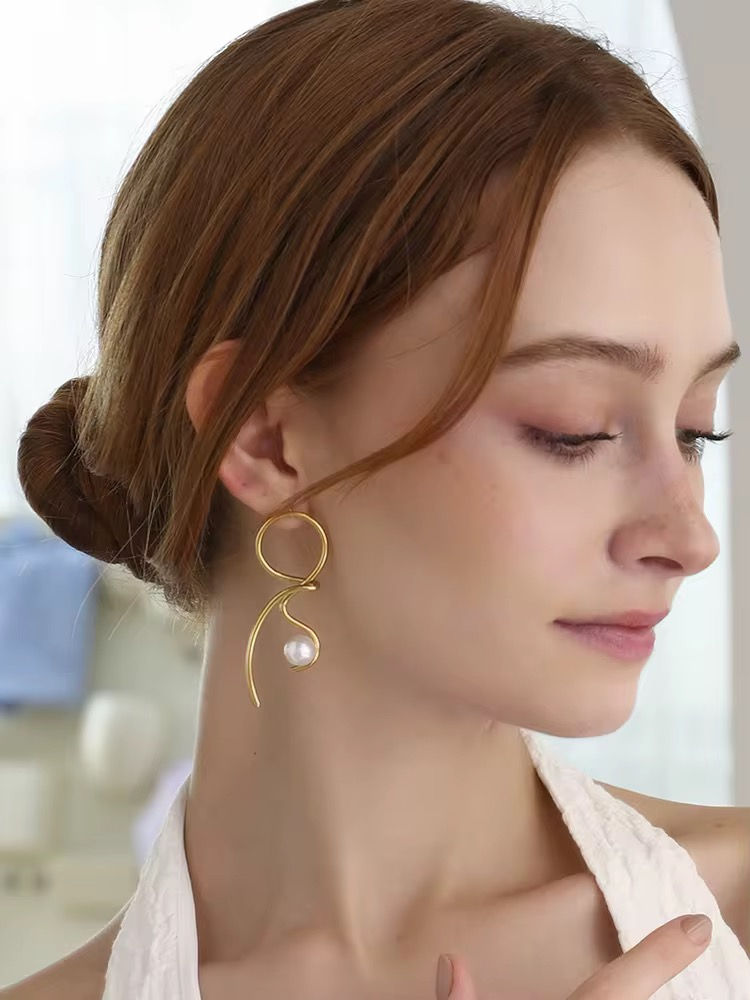 Thumbnail: Abstract Gold Earrings with Pearl Drops