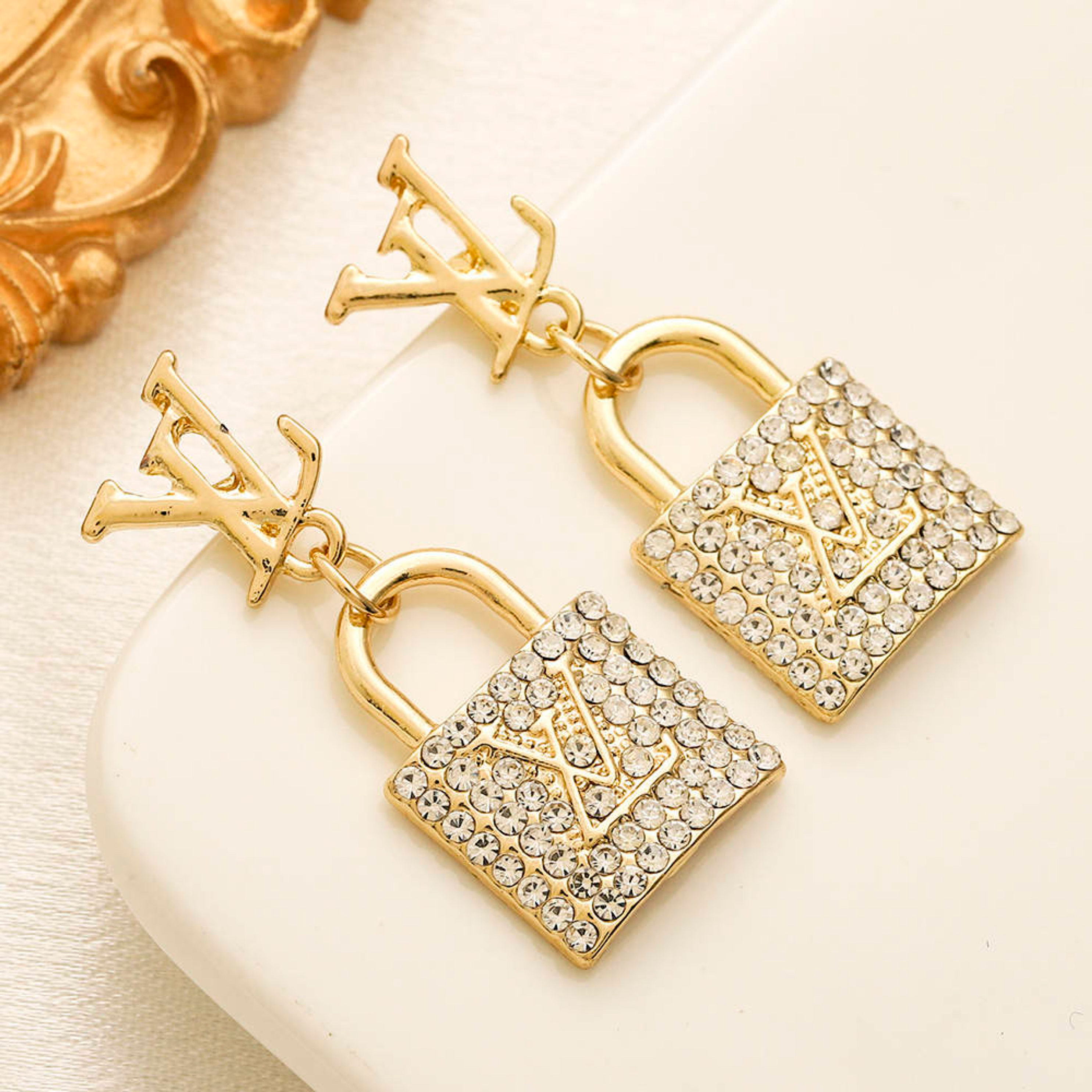 LV Diamond Lock Studs
