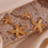 Thumbnail: Gold Star Fish Earrings