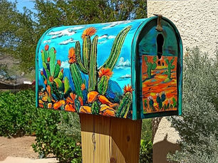 Tucson mailbox painted with cactuses and blue sky