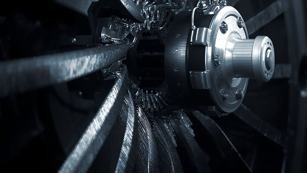 Parte interna de uma turbina metálica em tons de prata. Fibras cinza se entrelaçam em torno do eixo central. Atmosfera técnica e futurista.