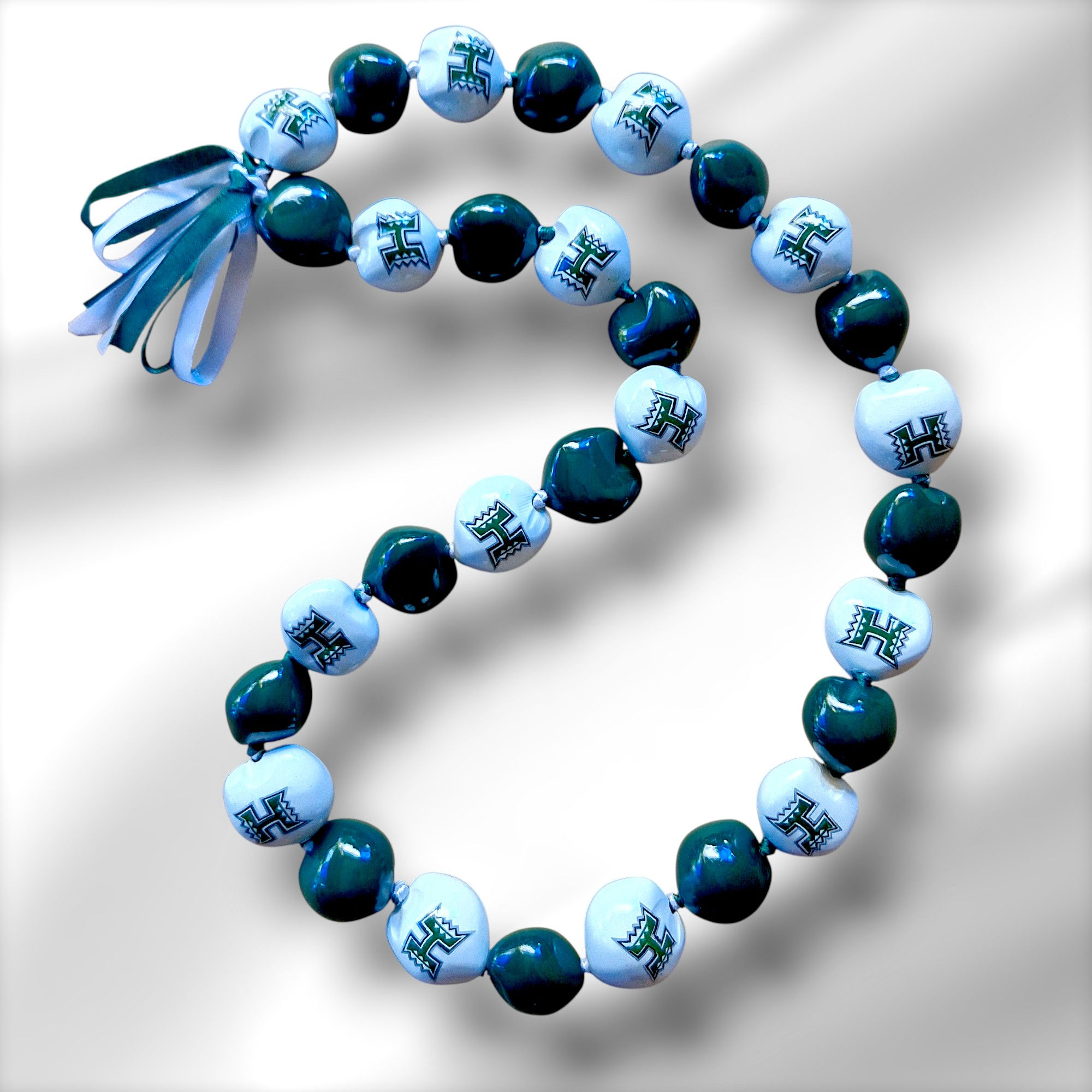 kukui nut lei event lei graduation lei grad lei corporate gifts sports lei painted kukui nut lei