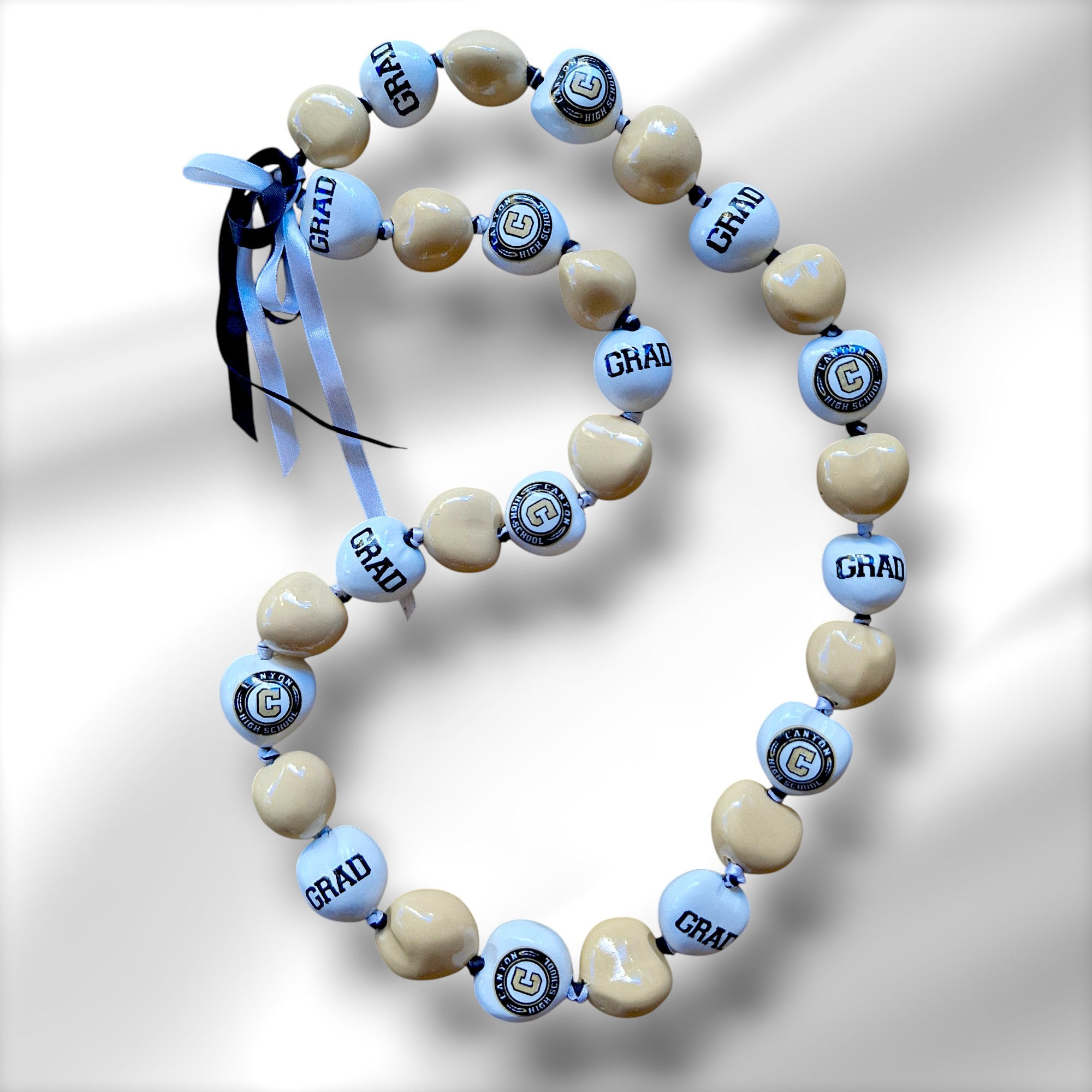 kukui nut lei, event lei, graduation lei, grad lei, corporate gifts, sports lei, painted kukui nut lei