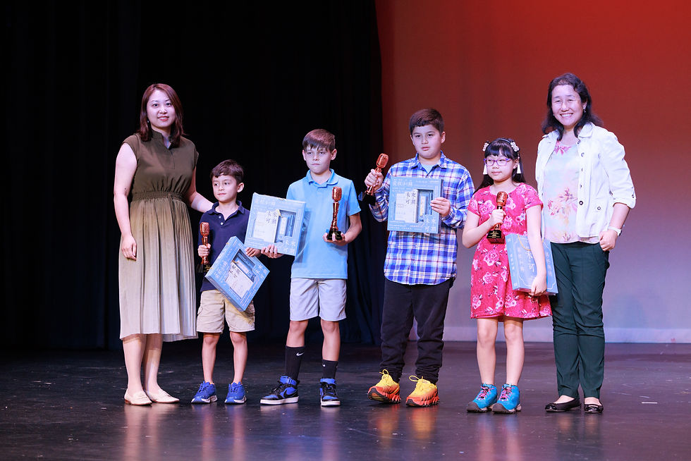 Ms. Diana Cheng and Ms. Yongling Zhang presenting Excellence Awards to a group of recipients.