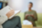 Psychologist services provider documenting patient progress notes