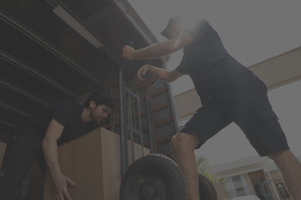 Big Dawg Movers crew loading furniture for a residential move