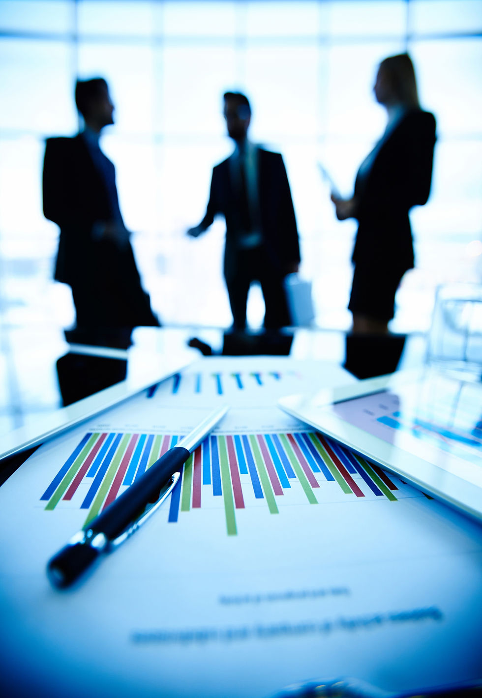 Business professionals collaborating on hotel sales strategy and revenue growt