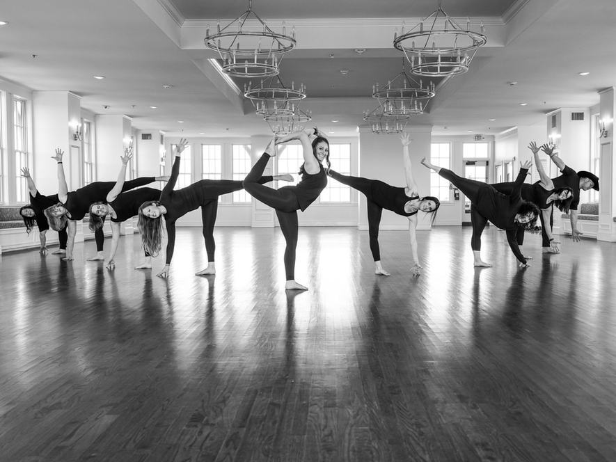 PÁV instructors pose in the half moon yoga pose. They teach yoga in Weatherford and Brock Texas.