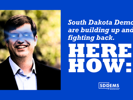 A photo of SDDP Executive Director Dan Ahlers with blue laser eyes alongside bold text that reads "South Dakota Democrats are building up and fighting back. Here's how:"