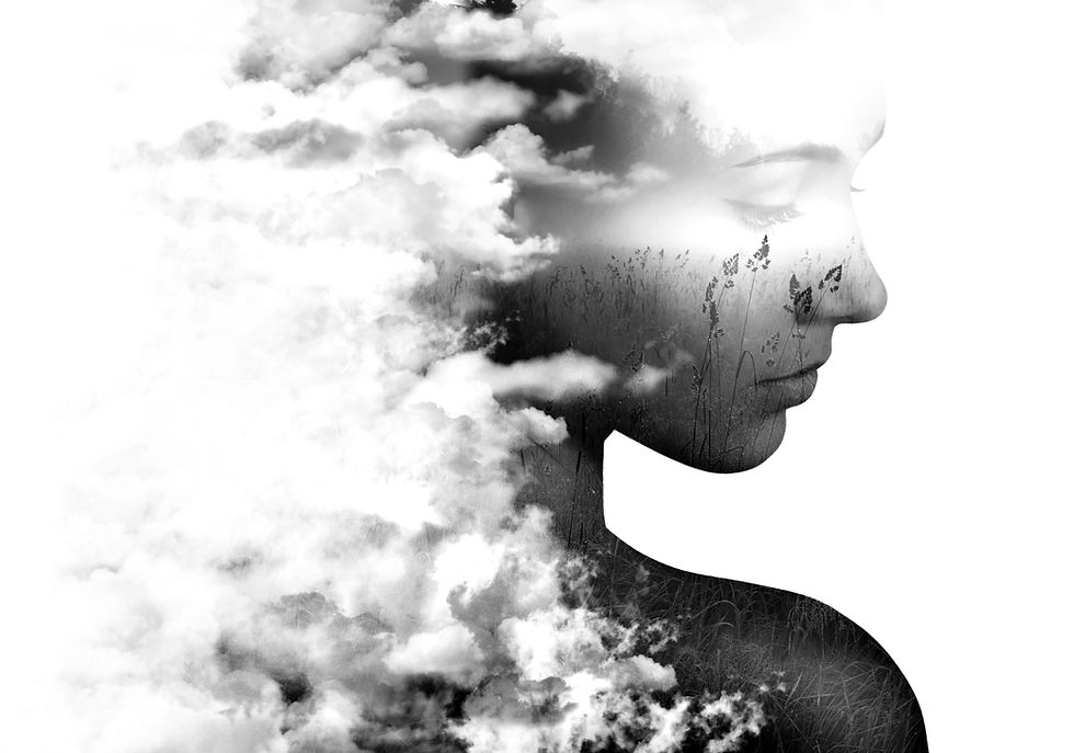womans face in the clouds