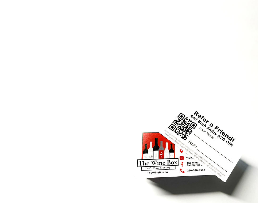 A stack of business cards that show the Wine Box Logo and the Referral program.