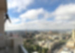 man doing abseil building maintenance
