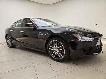 Black Maserati Ghibli luxury car front view available for rent - Luxury Car Rental in Southern California