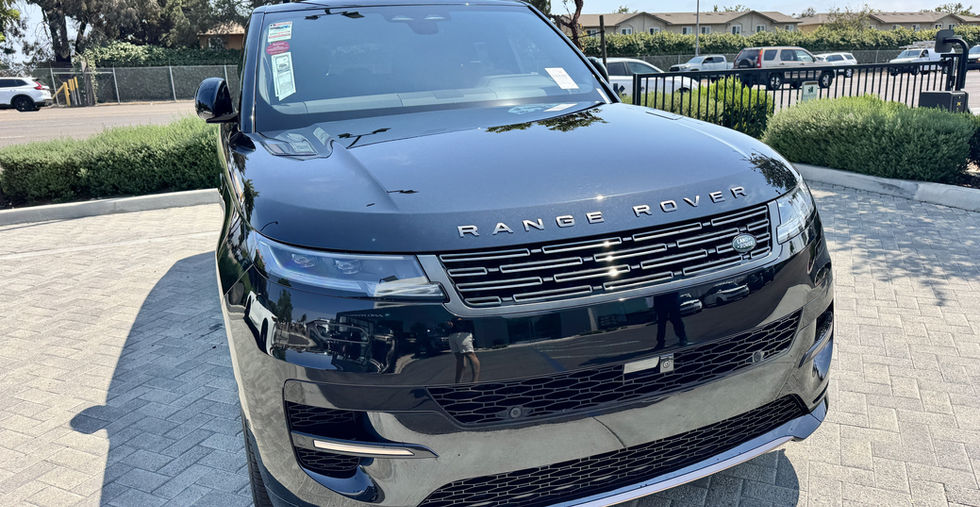 Front view of a black Range Rover Sport available for luxury SUV rental in La Jolla.