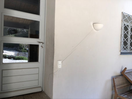 Diagonal crack in property wall