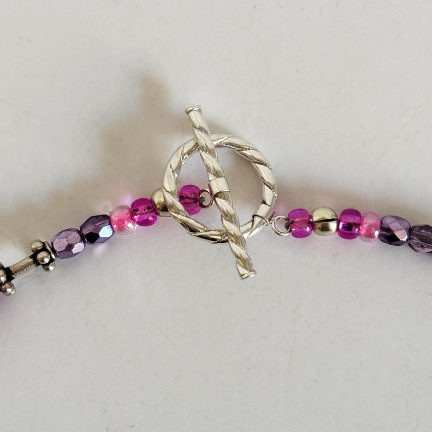 Pink turquoise necklace with rubies sapphires and sterling silver