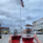 two partially full glasses of wine 