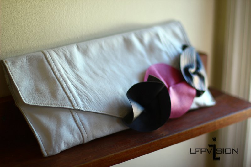 Upcycled white leather clutch