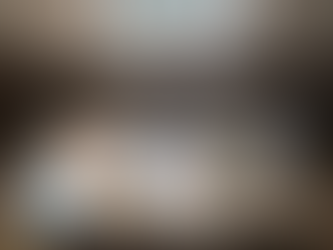 Artist preparing resin casting supplies in studio