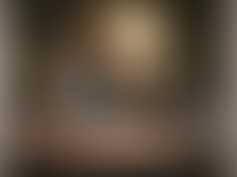 Artisan mixing resin in garden studio