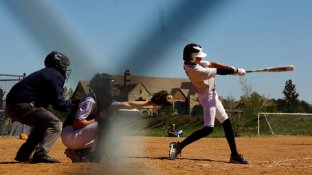 A baseball player batting