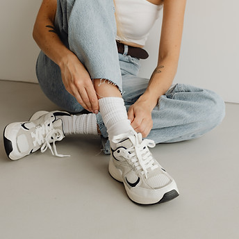 kaboompics_sneakers-shoes-long-white-striped-socks-27749.jpg