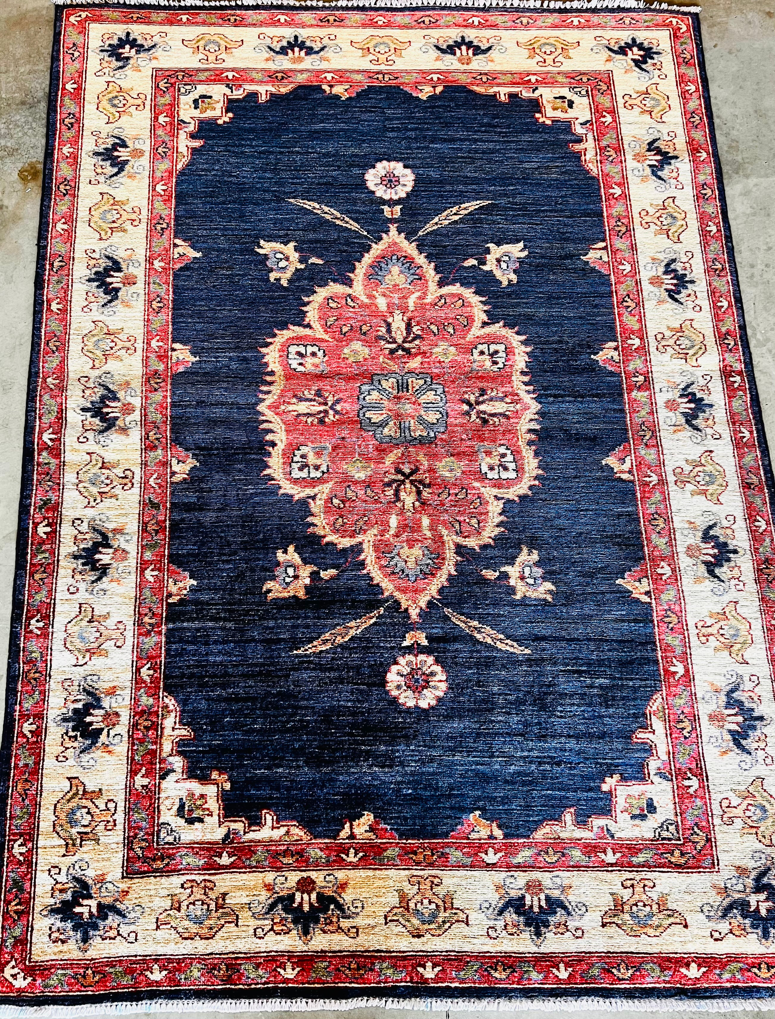 Red Medallion 5'8"L x 4'2"W