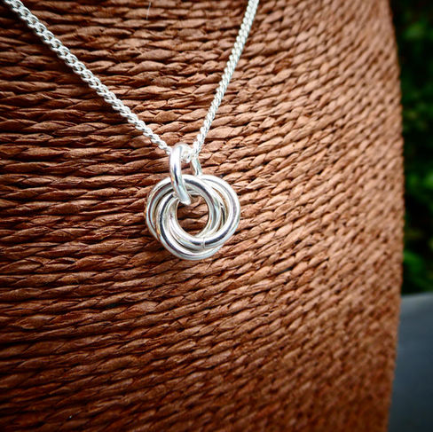 Sterling silver triple ring pendant