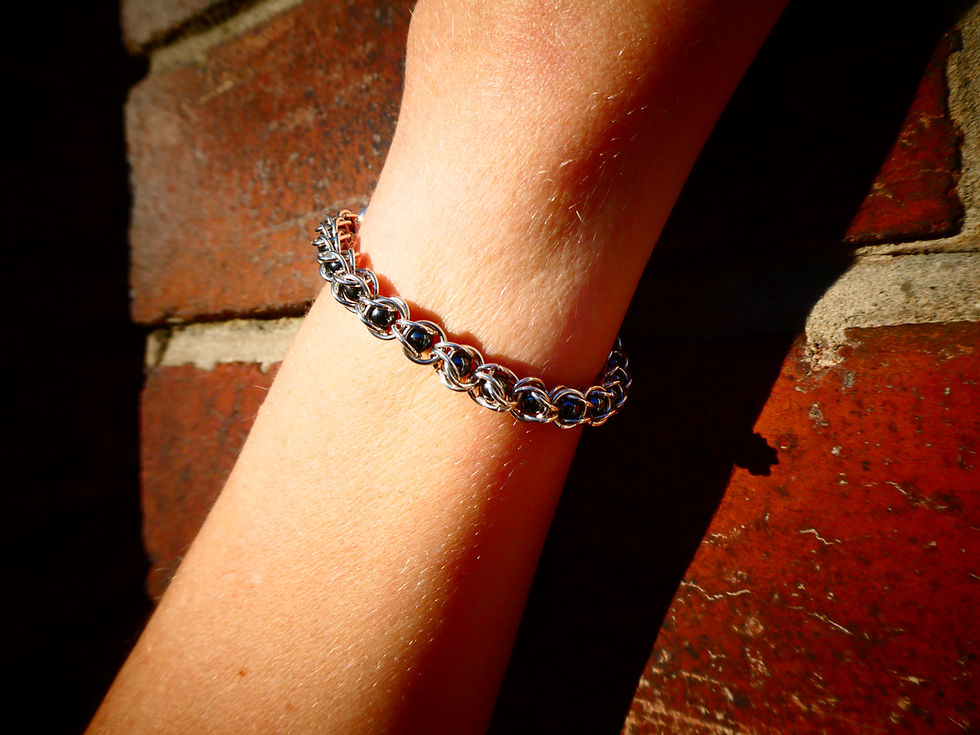 Thumbnail: Elegant, beautiful, stunning womens silver bracelet with hematite beads shown on wrist