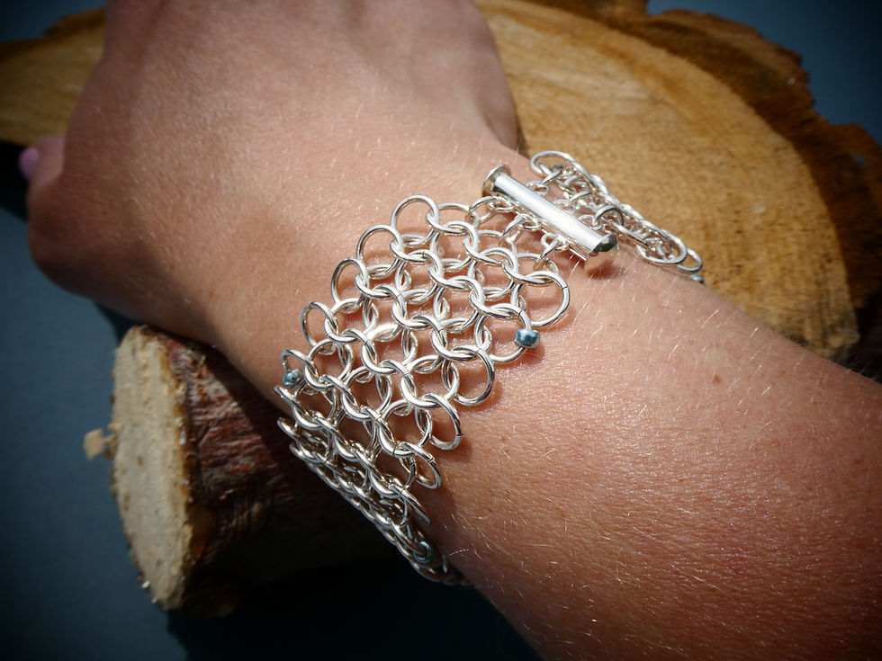 Thumbnail: Silver cuff, chain mail bracelet with japanese miyuki beads shown on women's wrist
