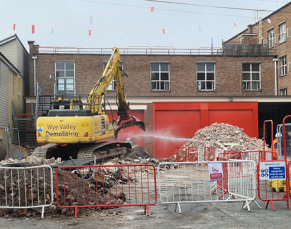 New era: Hereford Fire Station is being taken down by Wye Valley Demolition's crack team