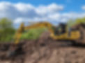 Komatsu PC210 LC excavator on a pile of earth at Hereford Quarries, loading construction and demolition waste into the washplant