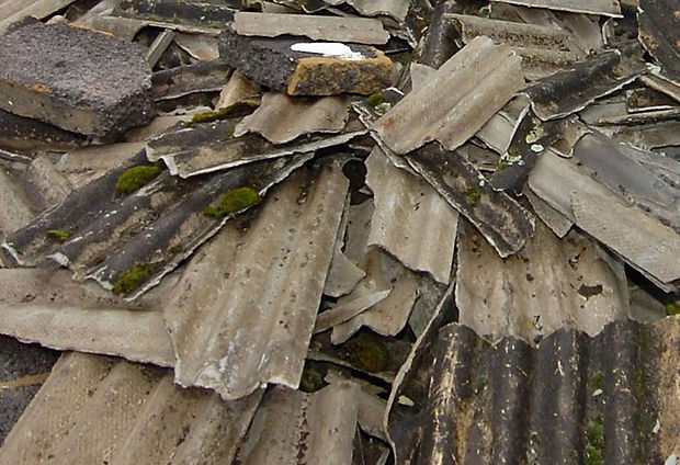 A pile of corregated asbestos ready to be safely removed and disposed of by Wye Valley Demolition