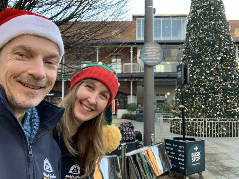 Rebekah and Graham busking Christmas steel pan music at Gunwharf Quays, Portsmouth