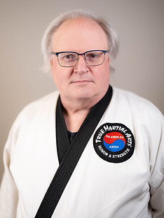 an image of SBN Dan Berg in uniform, smiling and facing the camera from the chest up