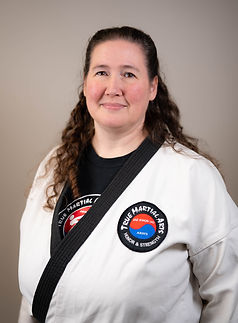 an image of GJN Jennifer Berg in uniform, smiling and facing the camera from the chest up