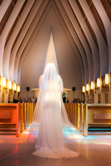 Bride about to walk down the aisle of catholic ceremony in Waikiki 