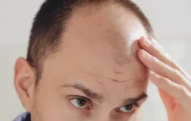 Can hypochlorous acid aid in healing when used during hair restoration surgery?