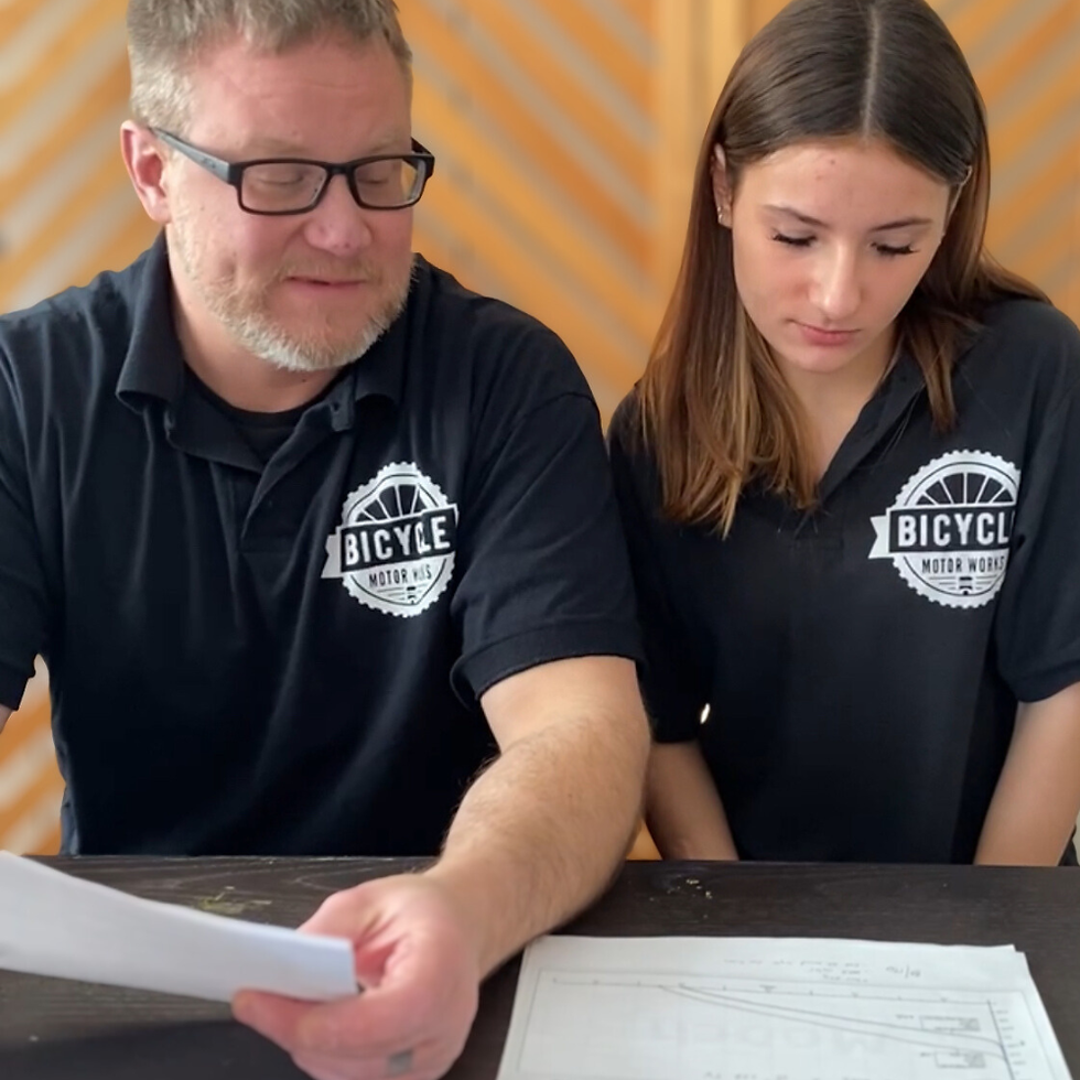 Matt and Sofia Reviewing Data on Innovator eBike Battery Series Bicycle Motor Works.png