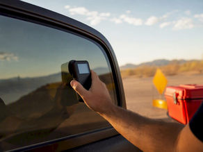 Tint meter measuring a vehicle window