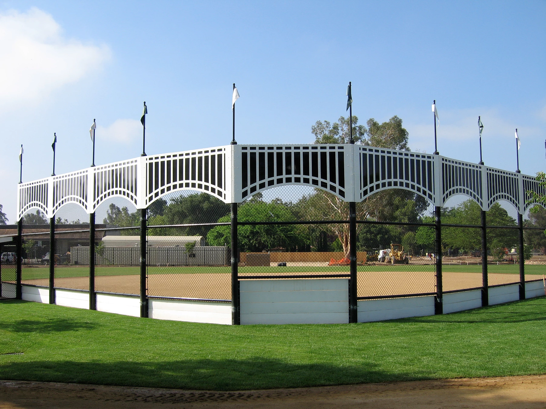 public chainlink fencing at baseball field of dreams california.webp