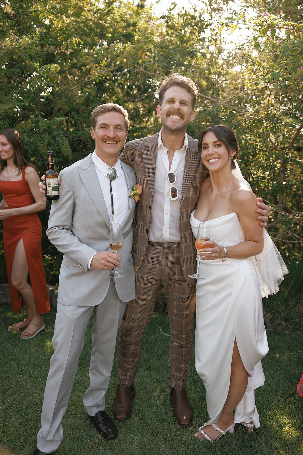 Newcastle wedding celebrant Adam celebrating with newlyweds after a fun and personal wedding ceremony.