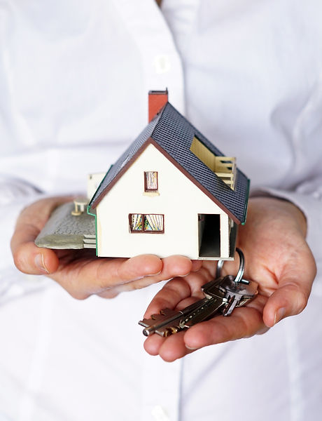 vertical-closeup-shot-person-thinking-buying-selling-house.jpg