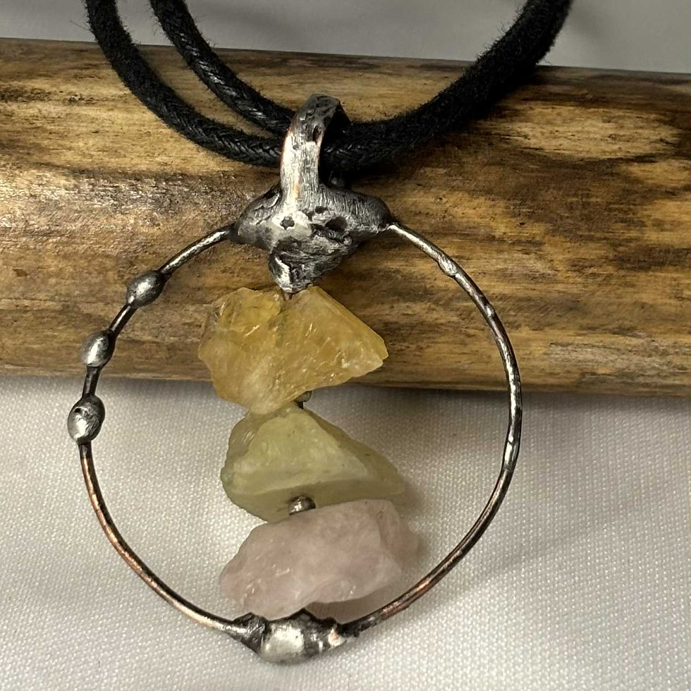 Hand-soldered copper relic pendant with raw Yellow Citrine, Green Calcite, and Rose Quartz stacked inside.